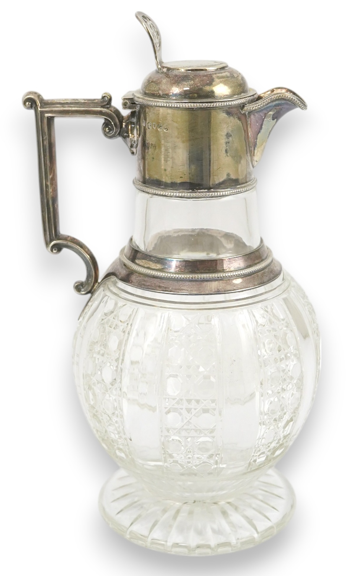 A late Victorian silver mounted cut glass claret jug, by Edward Hutton